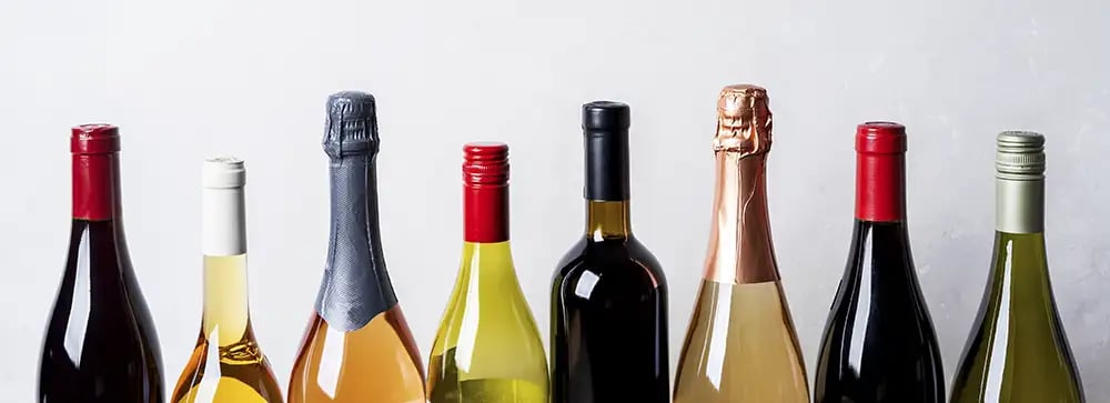 A variety of wine bottles on a white background