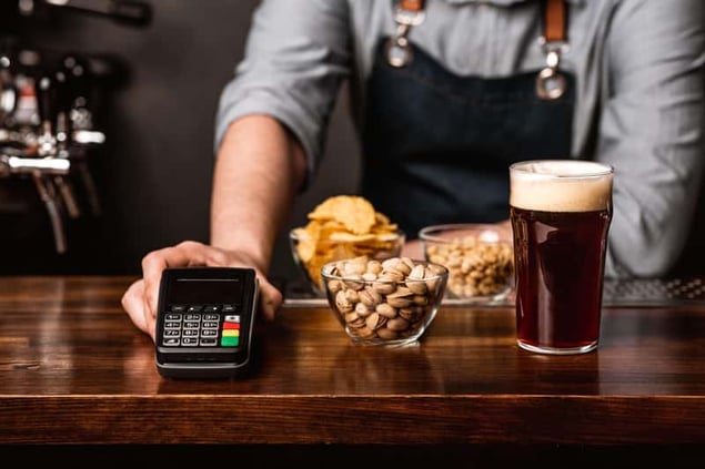 Bartender with credit card chip reader