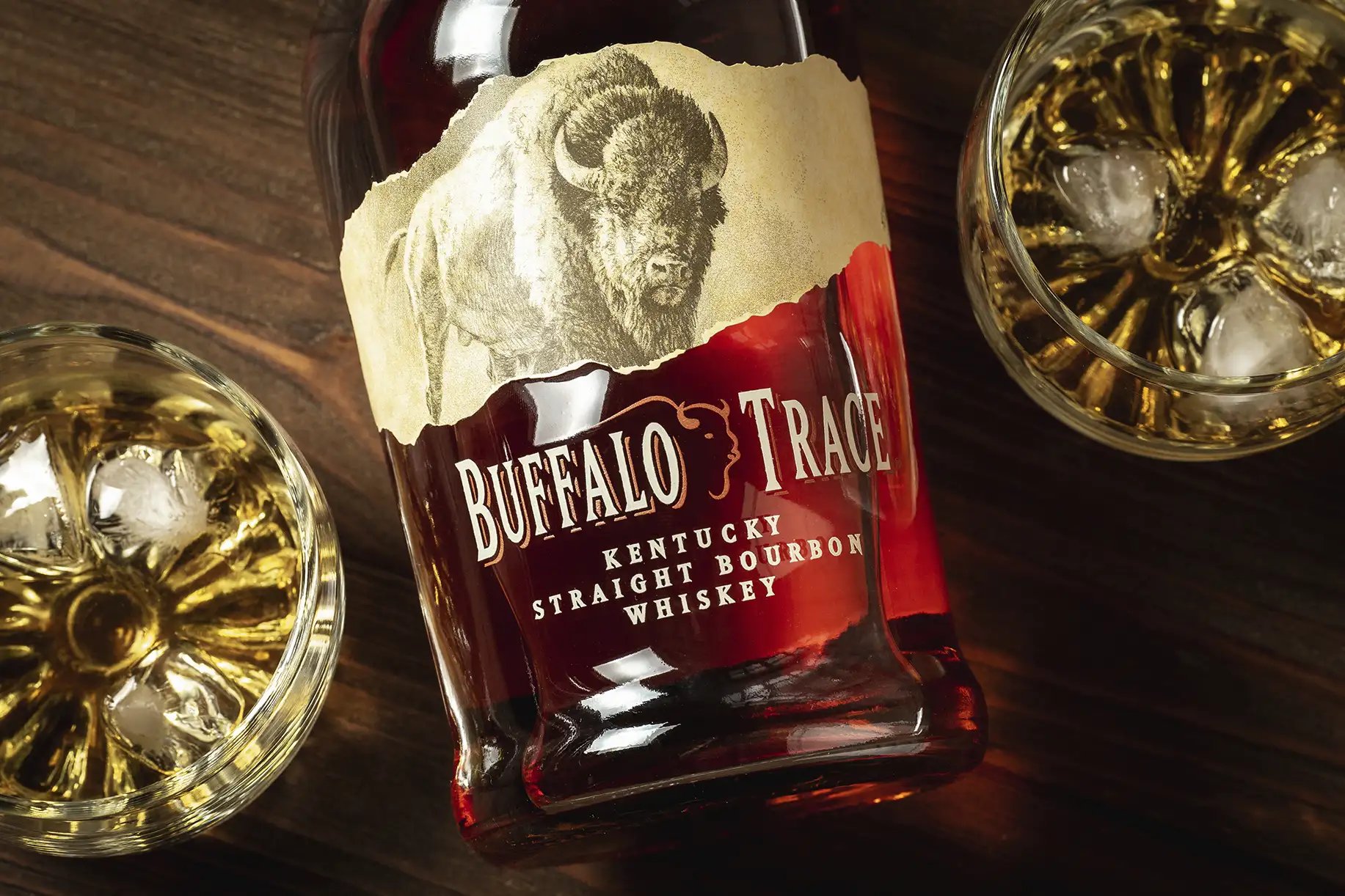 A bottle a two glasses of Buffalo Trace bourbon whiskey