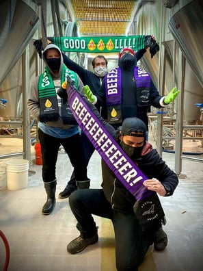 Freinds at Austin Beerworks showing off new soccer themed scarfs