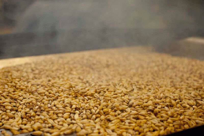 An image of smoked malts being produced