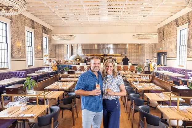 Supperland owners pose inside dining room