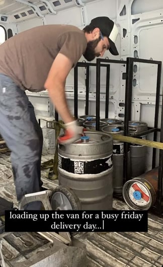 Birdsong Brewing team loading beer kegs for delivery