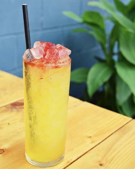 Tropical themed cocktail from Liquid Root Bottling Company