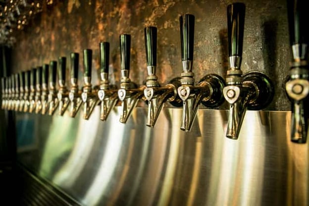 Close up of beer taps at The Hop Grenade