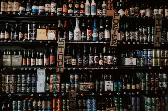 A variety of craft beers on a retail shelf