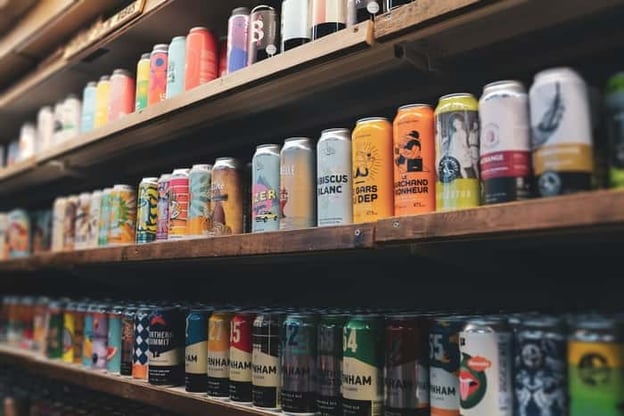 A variety of craft beers on a retail shelf